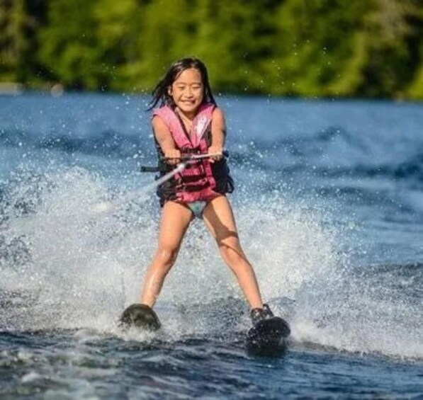 A person wakeboarding on a body of water. 2