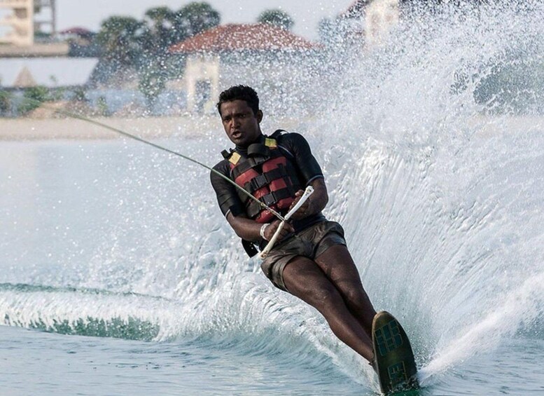 A person water skiing on a wave. 3