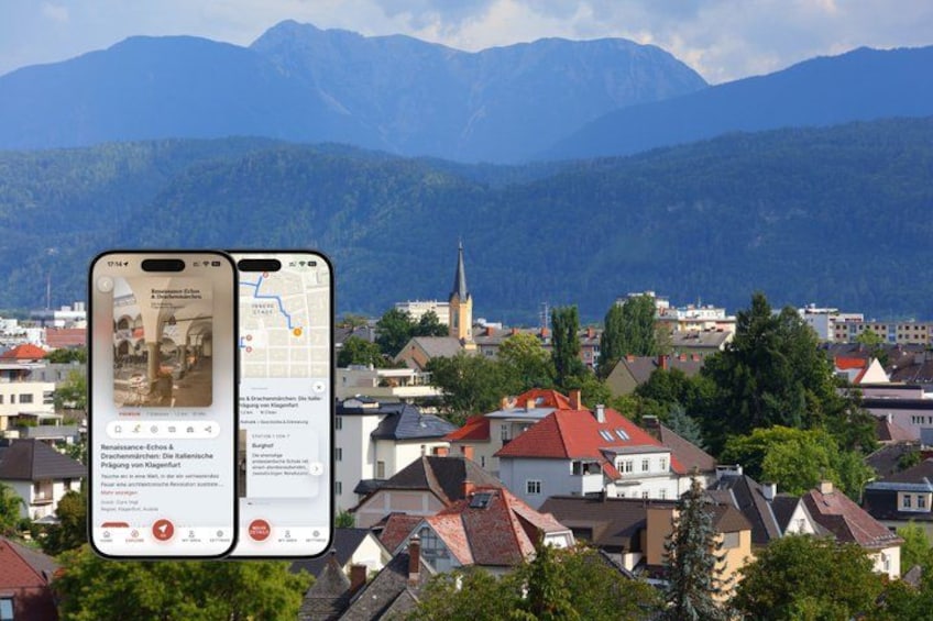 A smartphone displaying a map of a town with a church and mountains in the background. 1