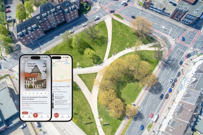An aerial view of a city intersection with a mobile device displaying a map. 1