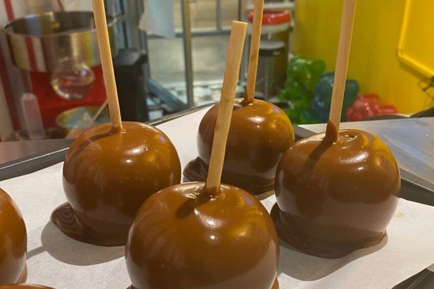 Caramel-coated apples on sticks. 5