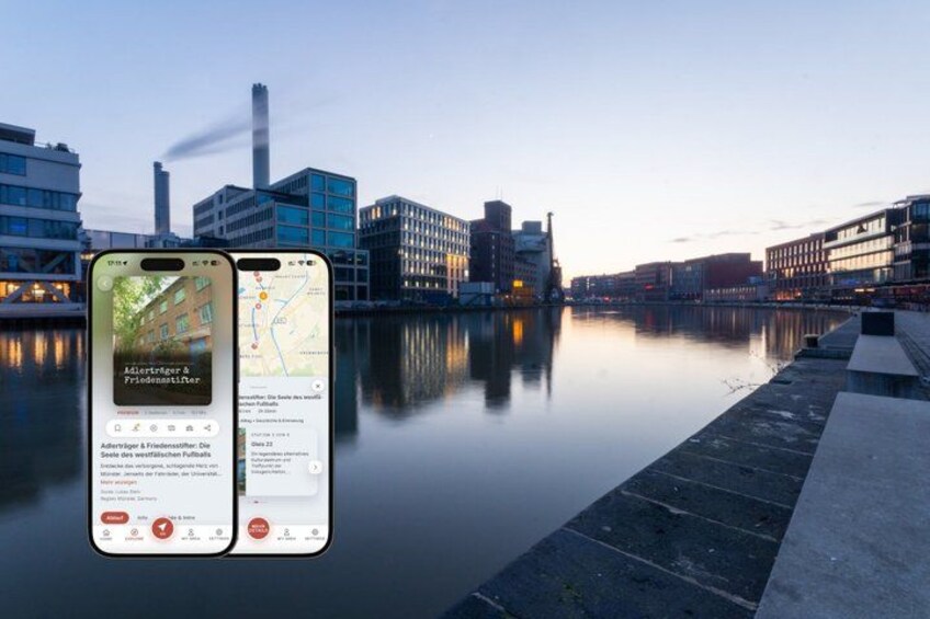 A smartphone displaying a map and an advertisement on a calm river with buildings in the background. 1
