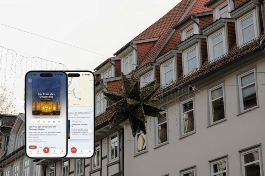 A smartphone displaying a map and a building with a red-tiled roof. 1