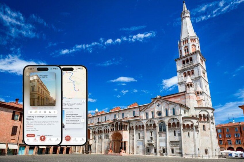 A historic building with a tall tower, a smartphone displaying a map, and a clear blue sky. 1