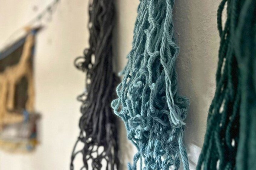 Various ropes hanging on a wall. 2