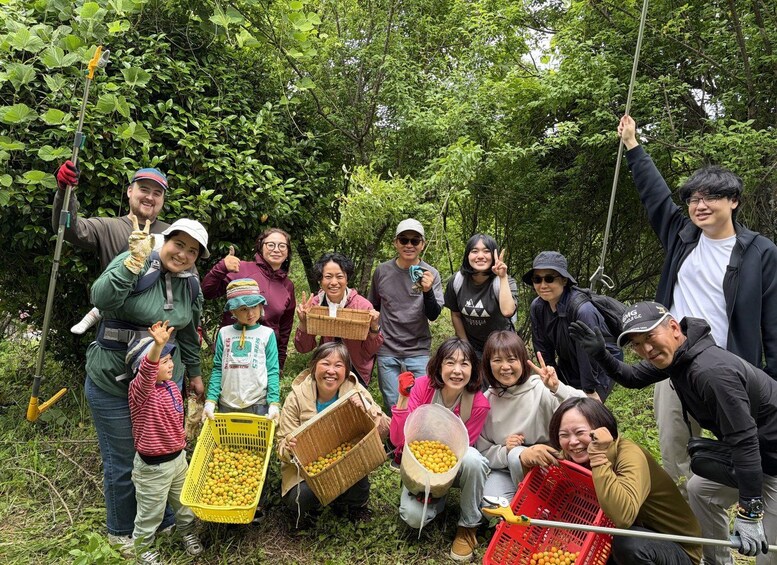 A group of people in a forested area, some holding baskets and tools, likely engaged in harvesting or collecting. 2