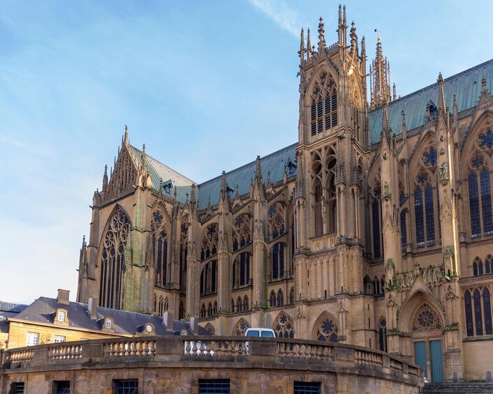 A Gothic-style cathedral with intricate architecture, including pointed arches and detailed stonework. 2
