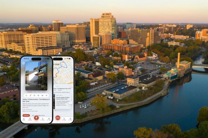A cityscape with a river, buildings, and a smartphone displaying a map. 1