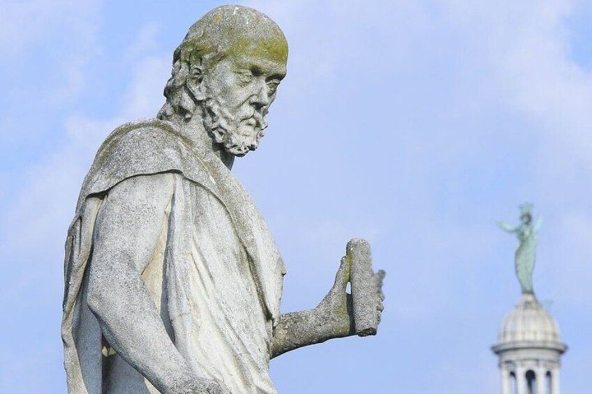 A statue with a clear sky in the background. 3