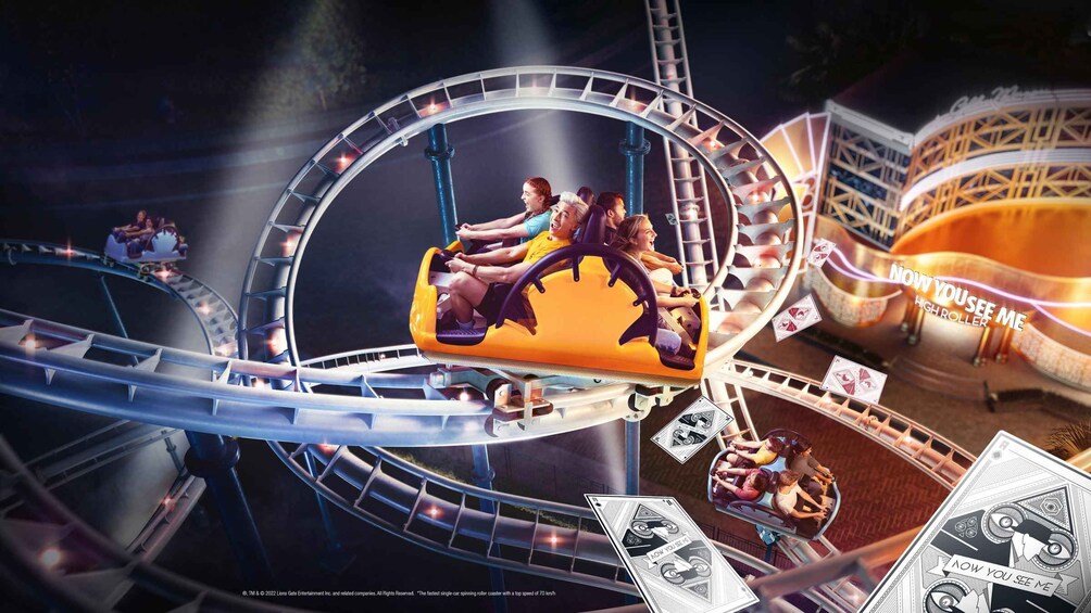 A roller coaster with passengers in yellow cars. 1