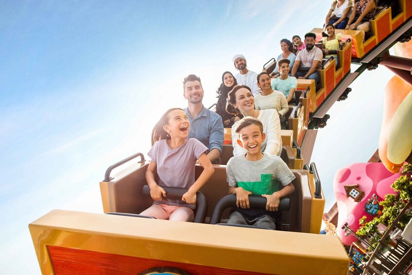 A group of people on a roller coaster. 5