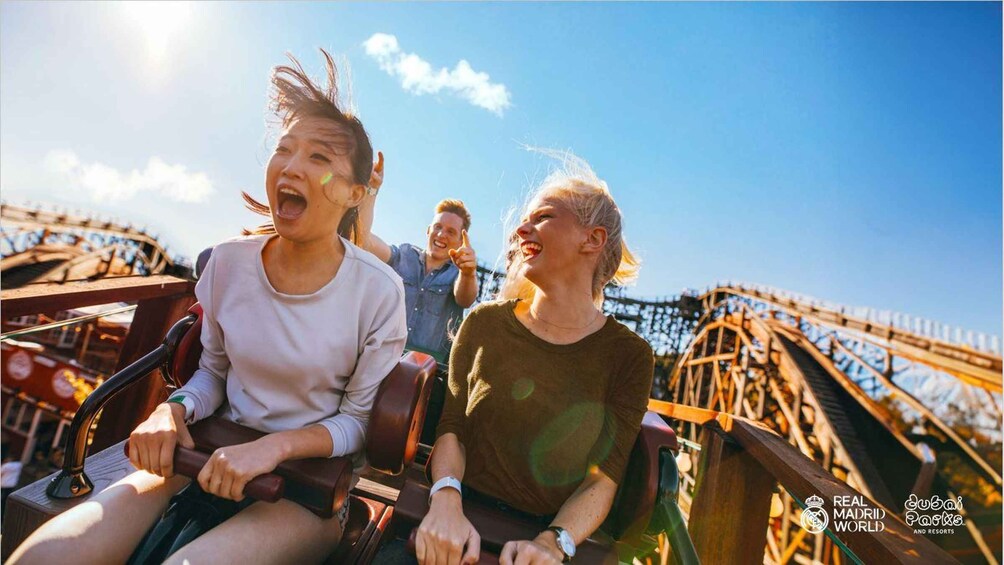 People on a roller coaster at an amusement park. 5