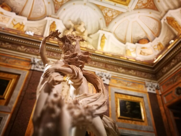 Apollo and Daphne statue shot from below