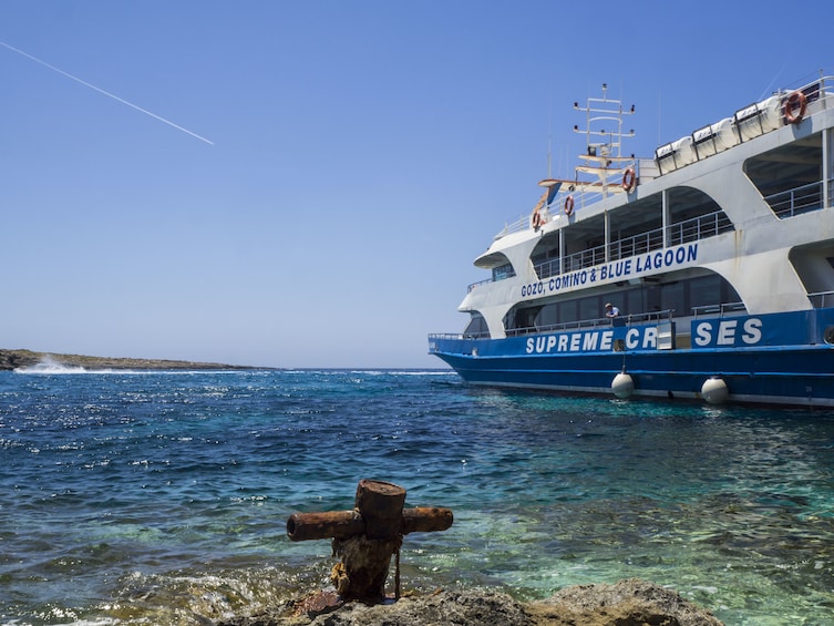 Blue waters of Comino Island with cruise ship to the side 5