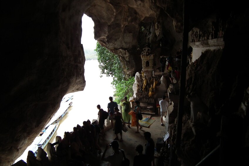 Dark inside of Pak Ou Caves in Laos 5
