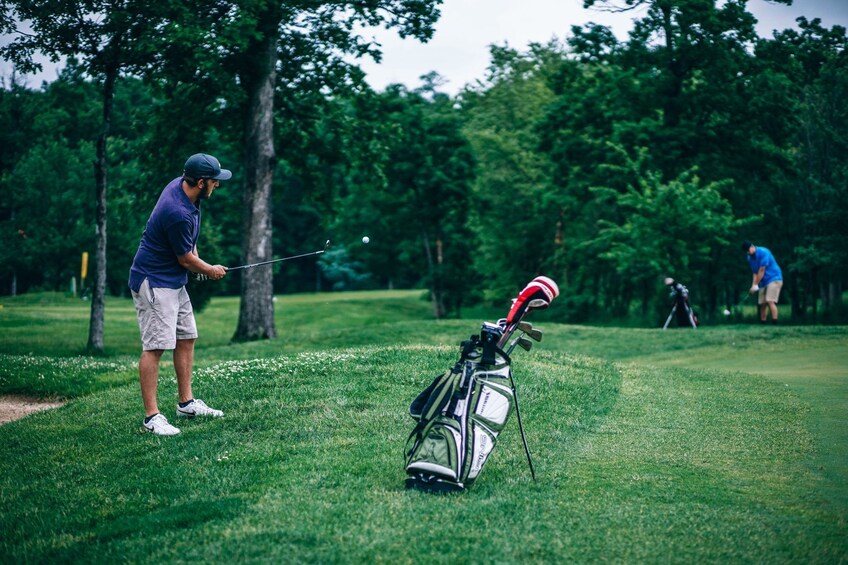 Men golfing at Song Gia Golf Country Club