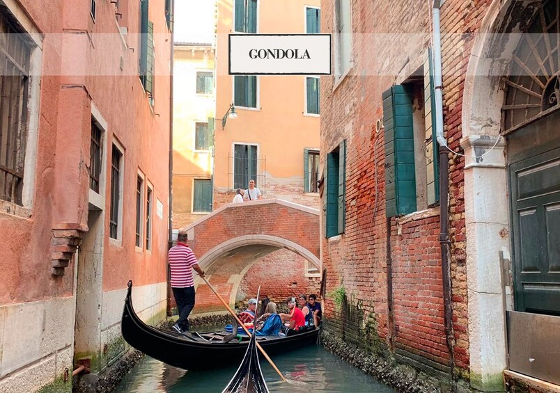 Gondola on a canal in Venice