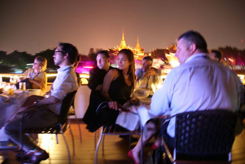 Guests aboard the Chaophraya dinner cruise