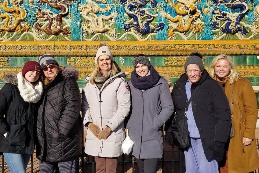 The Nine Dragon Wall bursts with vibrant colors and powerful dragon symbols—a stunning highlight on our Chinatown Food Tours. Food Tours in Chinatown bring this historic landmark’s meaning to life. 3
