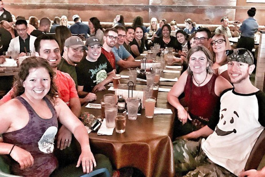 Guests on our Chinatown Food Tours sit together smiling as they share delicious dishes, swap stories, and enjoy the fun, social energy that makes Food Tours in Chinatown a memorable experience. 3