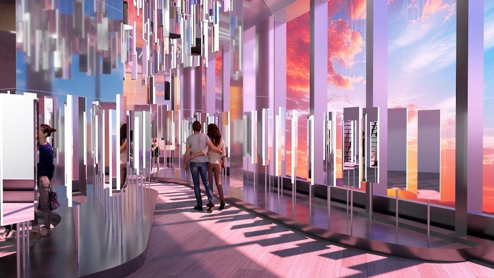 A modern interior with reflective surfaces and a sunset view. 2