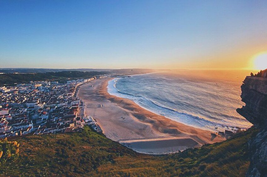 Nazaré: Iconic fishing village views! ⚓ Home to world-record waves and a beautiful coastal town 3