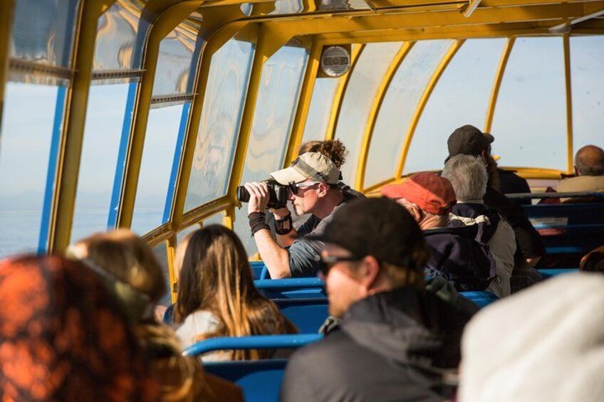 Visitor snaps photos from the boat during a half-day tour of the Strait of Georgia. 3
