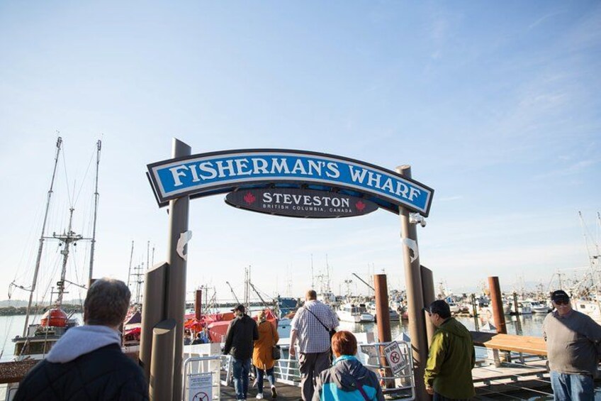 Travelers board boats at Fisherman’s Wharf in the coastal seaport city of Vancouver, Canada. 5