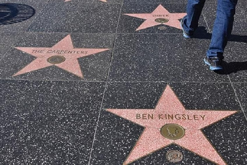 A section of the Hollywood Walk of Fame with stars for The Carpenters and Ben Kingsley. 4