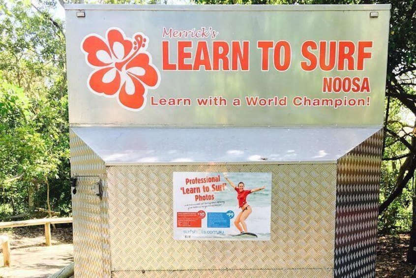 A surf lesson advertisement with a logo and a poster. 1