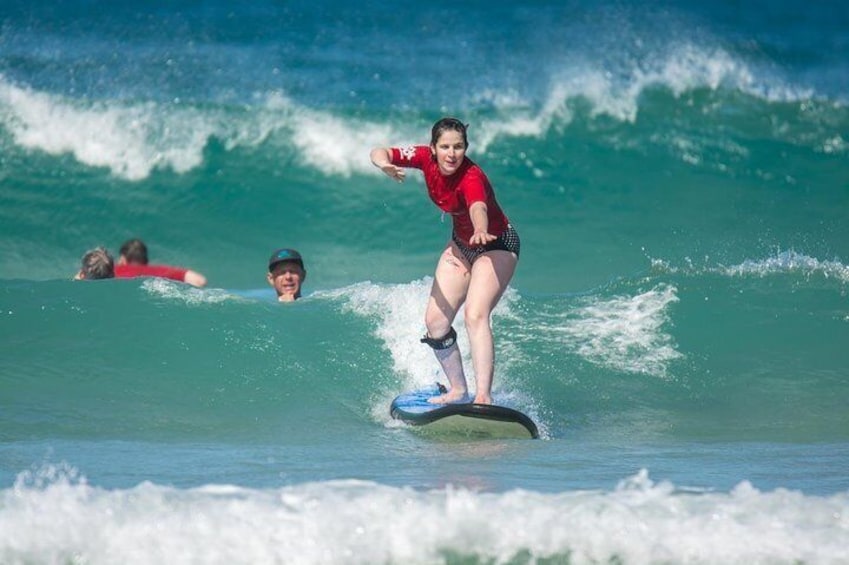 A person surfing on a wave. 4