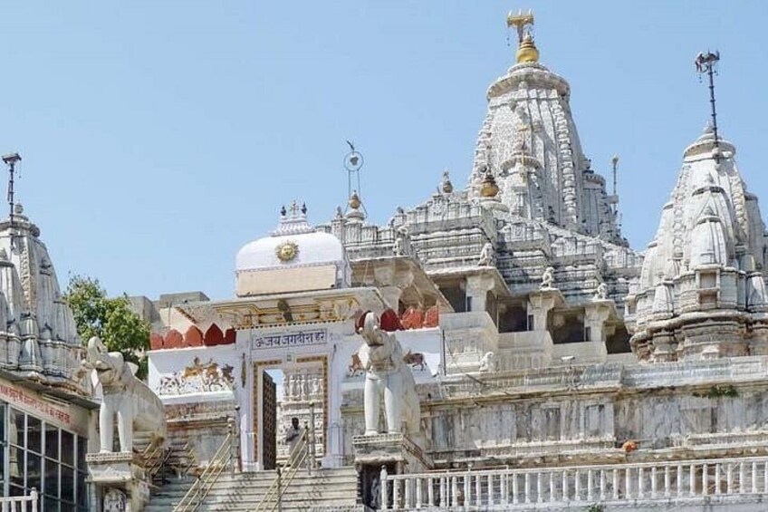 A temple with intricate architecture, including domes and spires, and a prominent entrance gate. 4