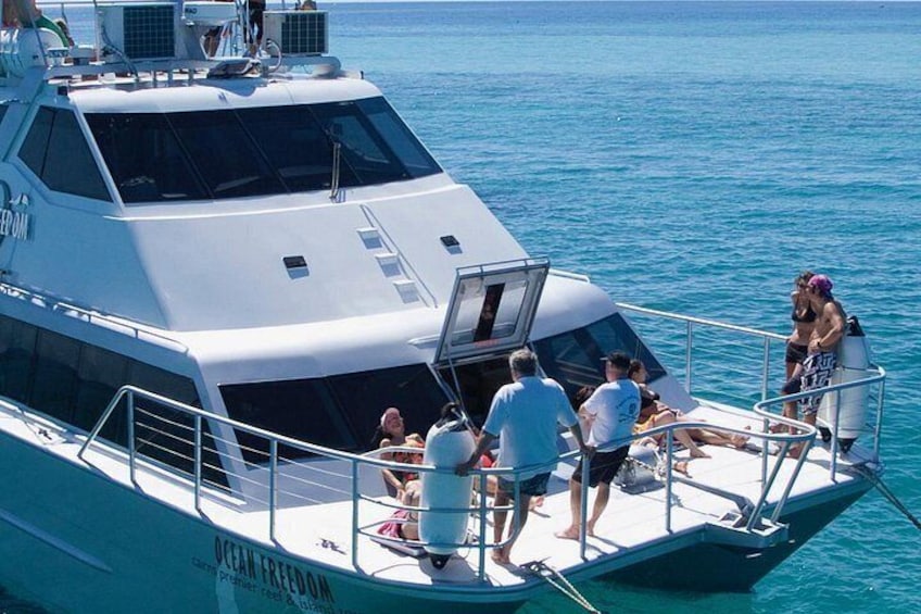 Relaxing on bow of Ocean Freedom 2