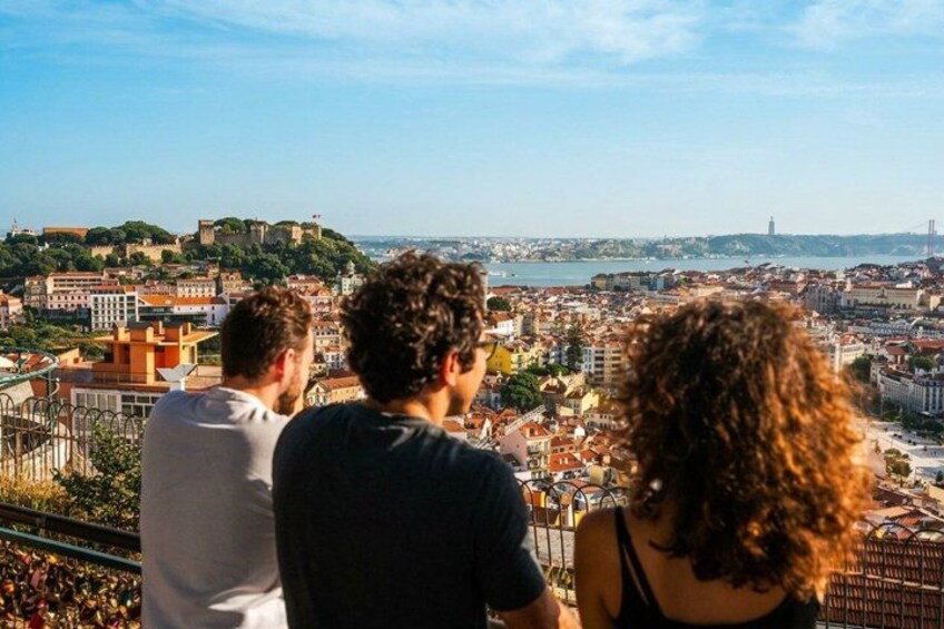 A cityscape with a prominent hill and a castle-like structure. 5