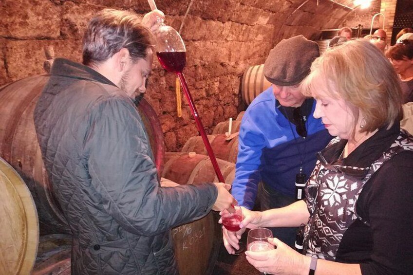 Wine tasting in a cellar 4