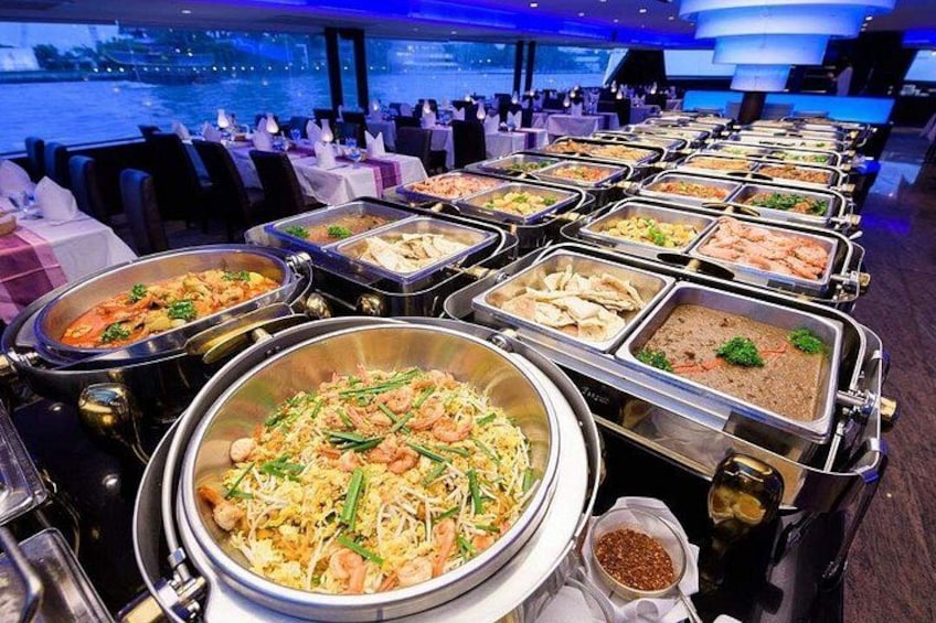 A buffet with various dishes, including seafood and salads, in a restaurant setting. 2