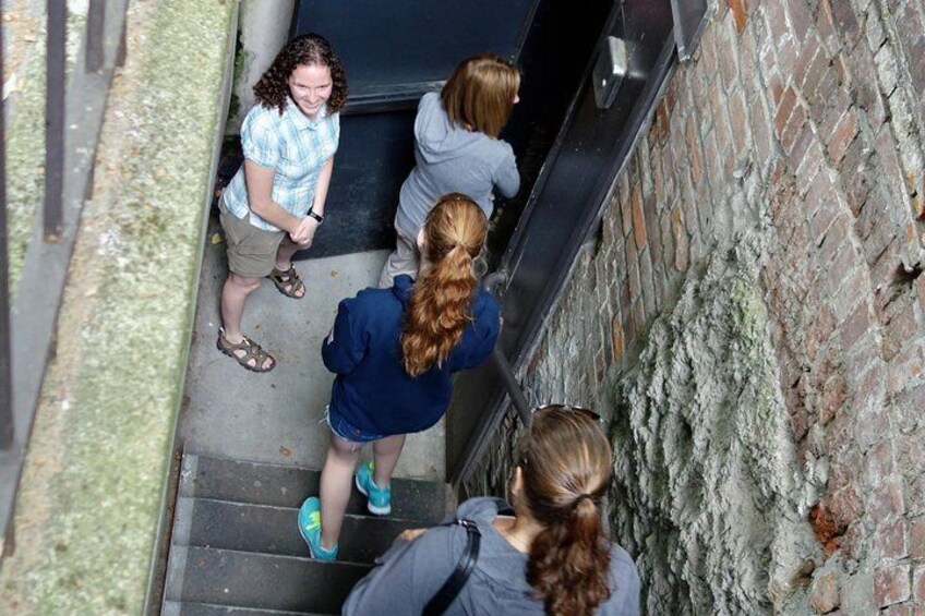 People descending a set of stairs in an urban environment. 5