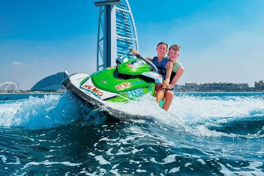 Show off your Jet Ski Skills in front of Burj Al Arab while our guide capture your best memories. 5