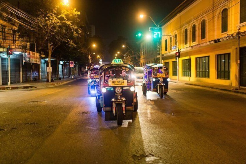 Two-passenger tuk-tuks are a fun way to travel, especially when traffic is lighter after dark. 3