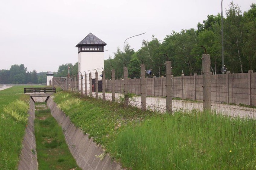 electric perimeter fence and the ditch 4
