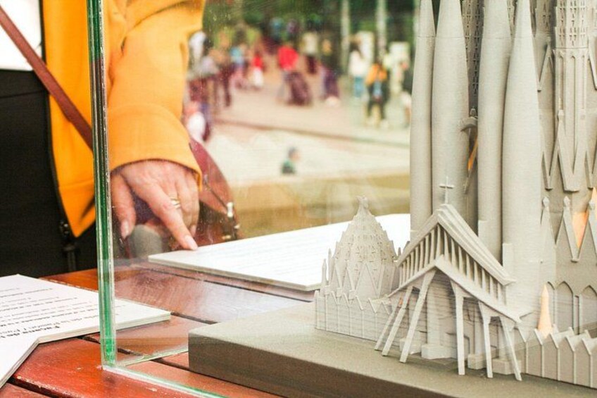 A model of a building with pointed towers and a detailed facade. 3