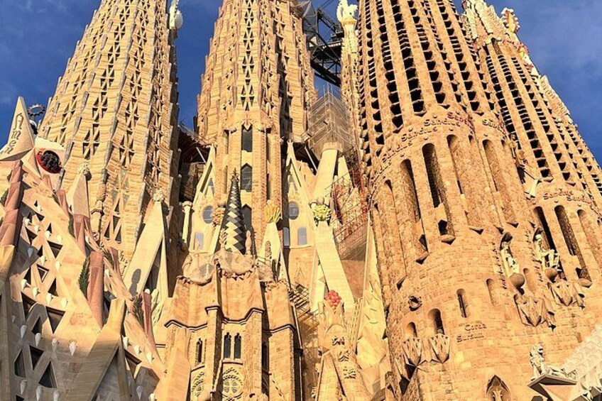 The intricate facade of a famous architectural landmark with ornate sculptures and detailed carvings. 2