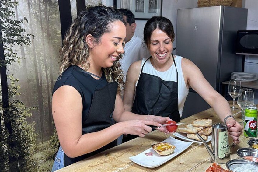Premium Paella Cooking Class, Sangría, 10 Tapas & market Boquería 5