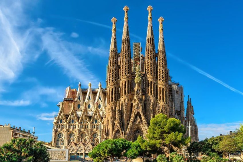 A large, ornate building with multiple spires and intricate architectural details. 1