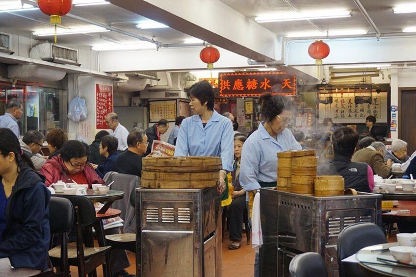 The traditional way of serving a variety of dim sum in food carts where you can choose which ones you would like to have 4