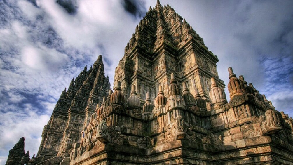 A large, intricately carved temple with multiple spires and detailed stonework. 4