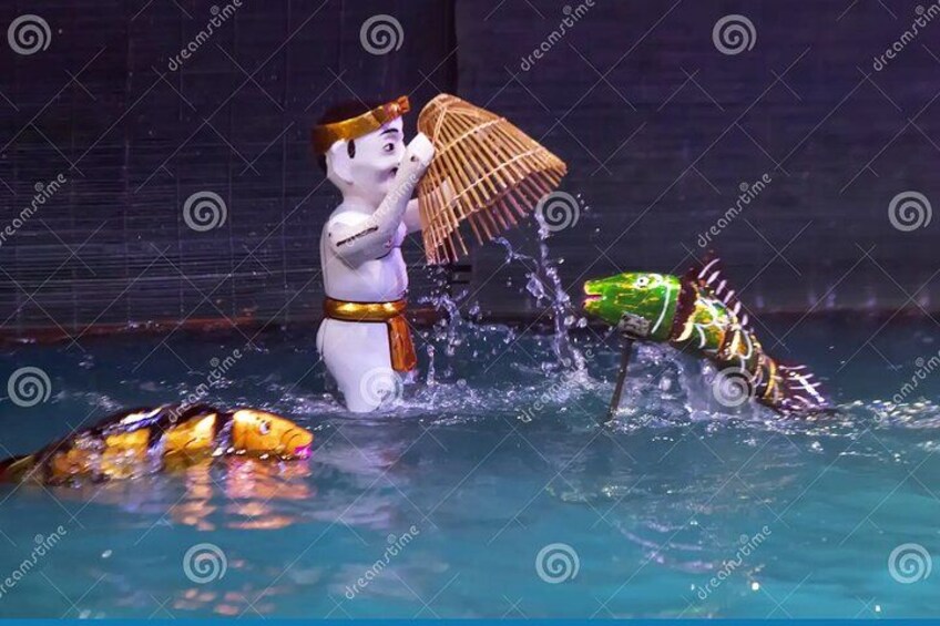 A person in a costume interacting with a fish in a pool. 3