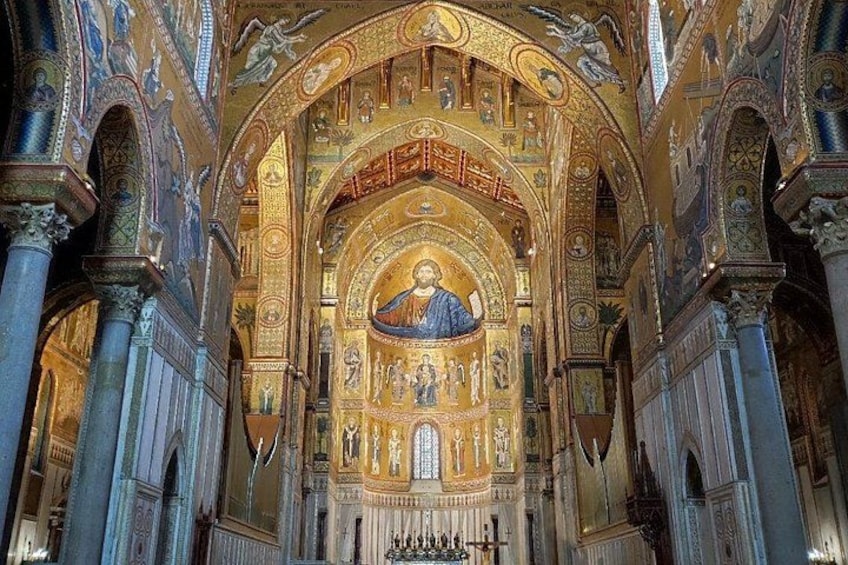 A grand interior with ornate golden mosaics, a central figure, and intricate architectural details. 5