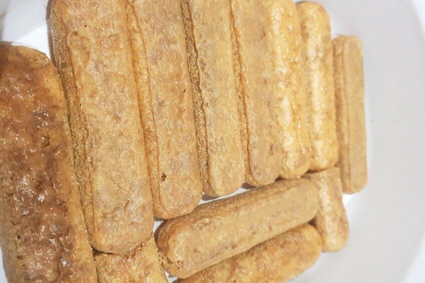 A plate of fried tofu sticks. 4