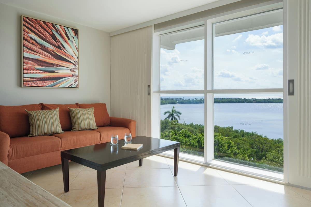Junior Suite, 1 Bedroom, Lagoon View | Pillowtop beds, in-room safe, desk, iron/ironing board